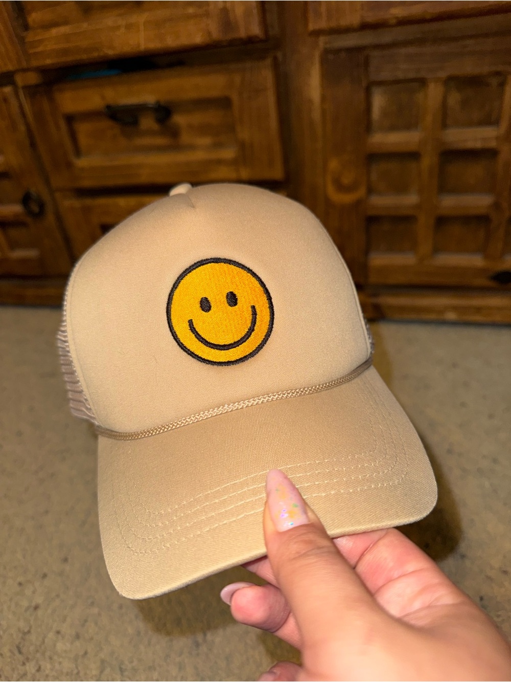 Beige Trucker Hat with Yellow Smiley Patch